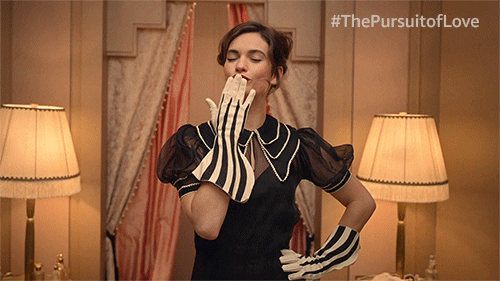 Lily James Flying Kiss GIF