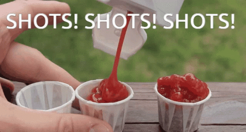 Lined Up Hot Sauce Shots GIF