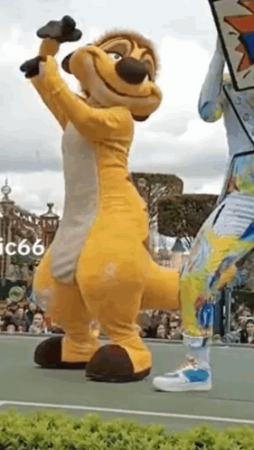 Lion King Mascot on Tennis Court with Microphone
