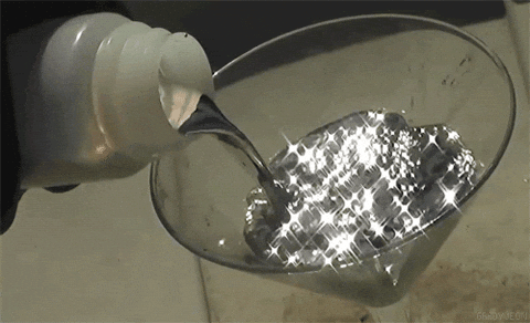 Liquid Silver Mercury Poured In Wine Glass GIF