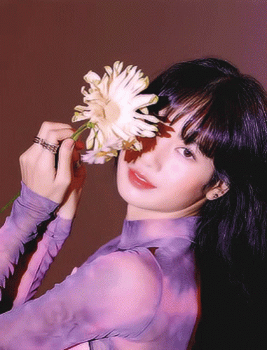 Lisa Of Blackpink Holding Flower To Her Face GIF