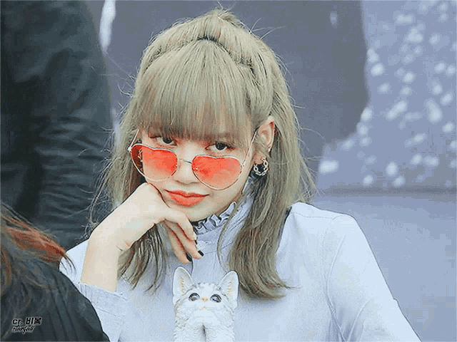 Lisa Of Blackpink Playfully Winks To Camera GIF