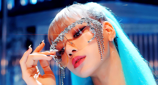 Lisa Of Blackpink Showing Her Glammed Up Glasses GIF