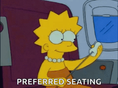 Lisa Simpson Sitting on Airplane Talking on Cell Phone