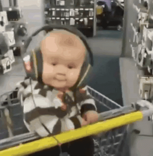 Listening To Music Cute Baby In Cart GIF