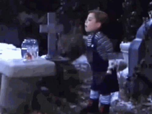 Little Boy at Cemetery