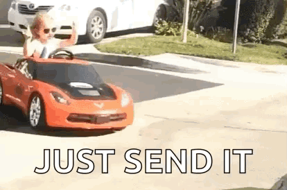 Little Boy Driving Toy Car On Street GIF