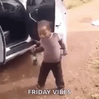 Little Boy Holding Water Bottle In Front Of Car GIF