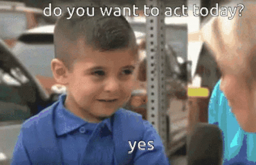 Little Boy in Blue Shirt Talking to Woman