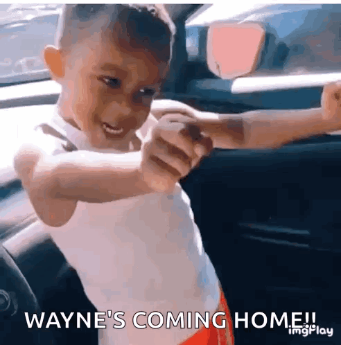 Little Boy in Car Saying Waynes Coming Home
