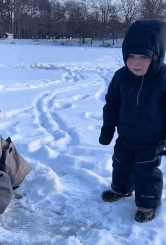 Little Boy in Columbia Jacket and Pants in Snow
