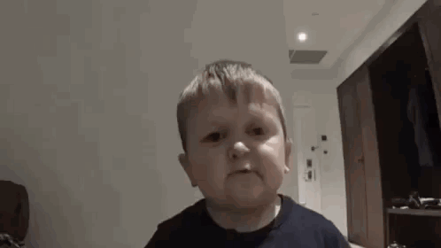 Little Boy Making Funny Face GIF