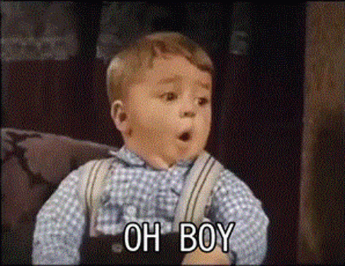 Little Boy on Couch Saying Oh Boy