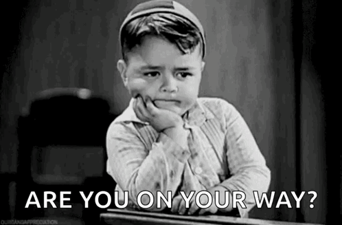 Little Boy Sitting at Desk Asking Are You on Your Way?