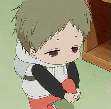 Little Boy Takes Off Cartoon Shoes GIF