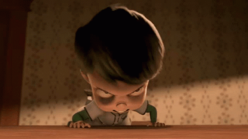 Little Boy With Black Eye Crawling on Wooden Floor