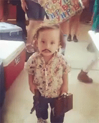 Little Boy With Fake Mustache Holding Suitcase and Gun