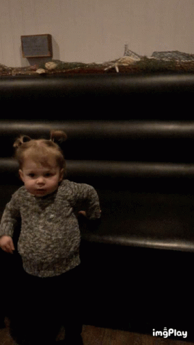 Little Girl at Black Staircase With Imgplay Sign