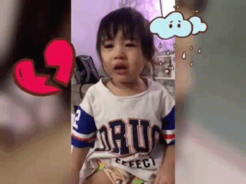 Little Girl Crying In Front Of Broken Heart GIF