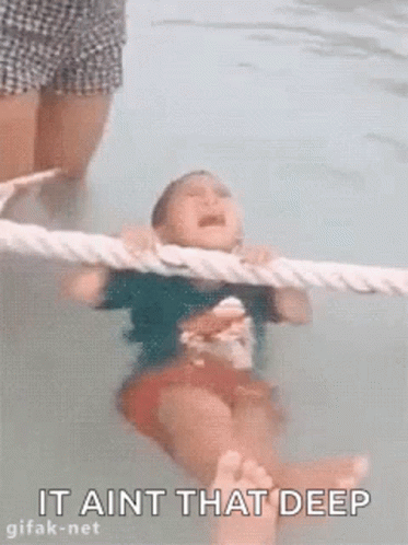 Little Girl Crying in Swimming Pool Held by Rope