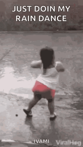 Little Girl Dancing in the Rain
