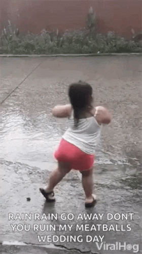 Little Girl Dancing in the Rain