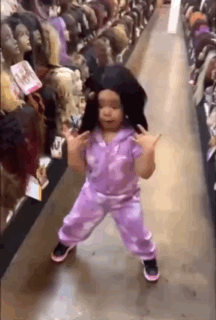 Little Girl Dancing with Wig