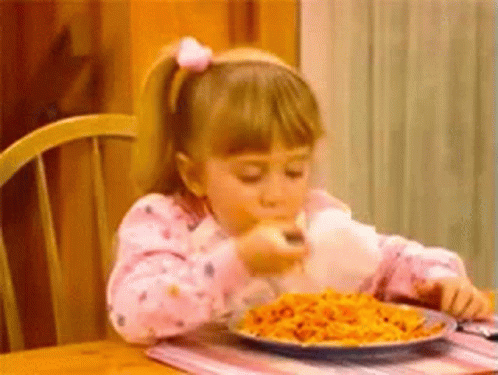 Little Girl Eating Spaghetti With Fork GIF