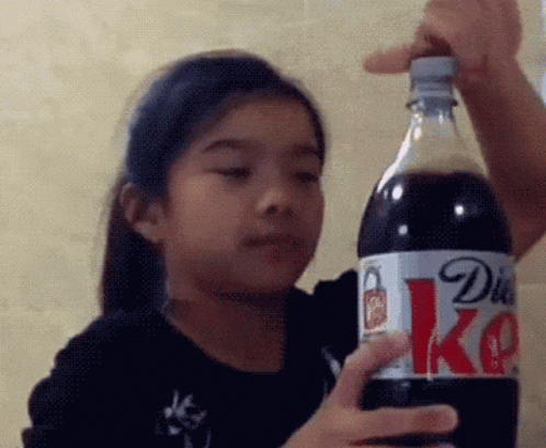Little Girl Holding Diet Coke