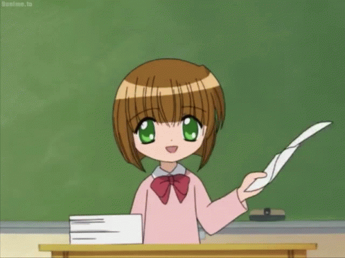 Little Girl Holding Paper at Blackboard