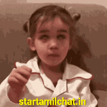 Little Girl Holding Something