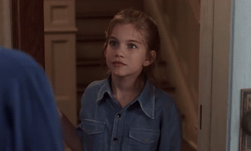 Little Girl in Denim Shirt Saying Sure