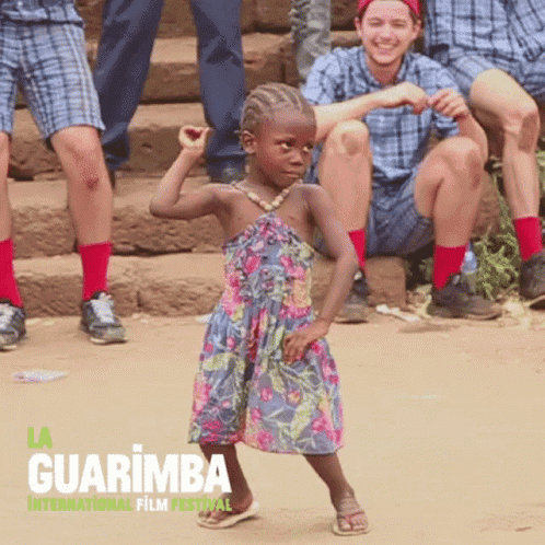 Little Girl In Dress Dancing At Guarimba Film Festival GIF