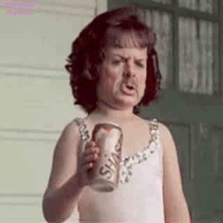 Little Girl in Dress Holding Soda Can