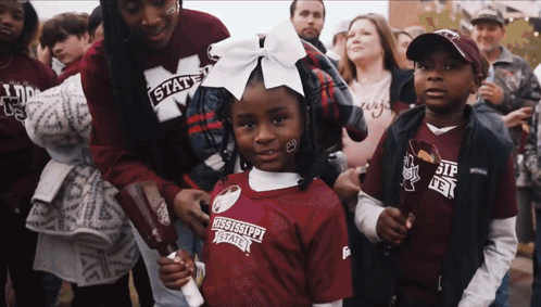 Little Girl in Mississippi State Jersey in Crowd