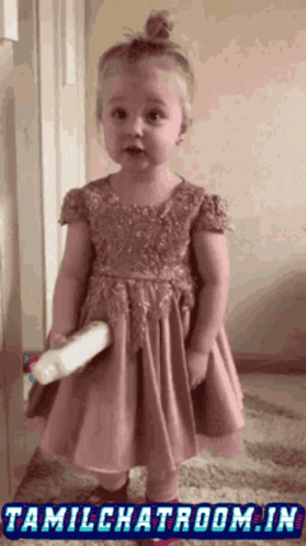 Little Girl In Pink Dress Holding Bottle With Tamilchatroom.in GIF