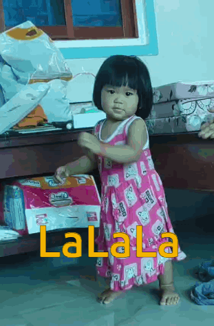 Little Girl in Pink Dress With Diapers Saying Lalala