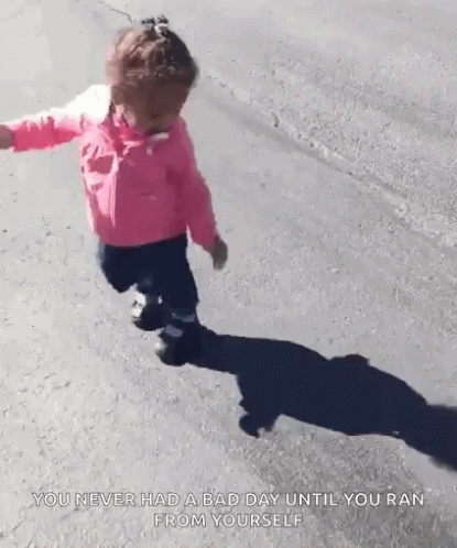Little Girl in Pink Jacket Walking with Shadow