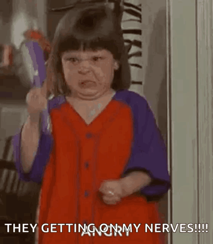 Little Girl in Red and Purple Dress Holding Scissors
