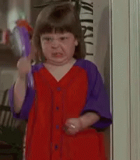Little Girl In Red Dress Holding Toy Gun GIF