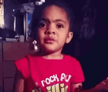 Little Girl in Red Shirt Rock Pu