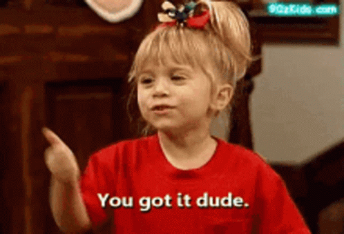 Little Girl in Red Shirt Saying You Got It