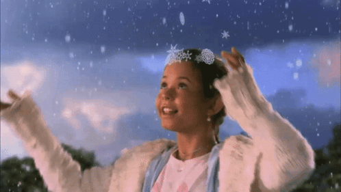 Little Girl in Snowflake Headband Looking Up