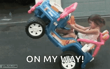 Little Girl In Toy Car Saying On My Way GIF