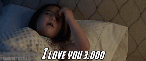 Little Girl Laying in Bed Says I Love You 3000
