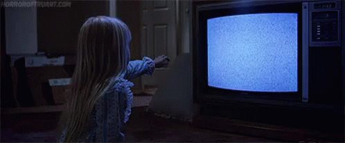 Little Girl Looking At TV With Ghost GIF