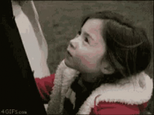 Little Girl Looking Up at Sky