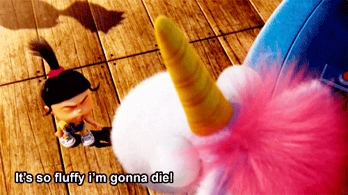 Little Girl Next to Stuffed Unicorn Saying It's So Fluffy I'm Gonna Die