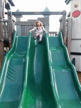 Little Girl On Slide Hair Raise GIF