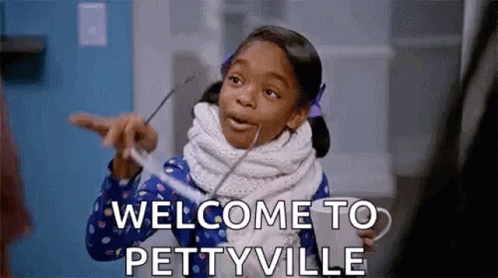 Little Girl Pointing and Saying Welcome to Pettonville